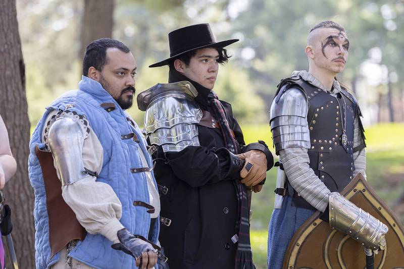 CER LARP game players Chris Stevens (left), Locagn Runte and Zander Dixon listen to rules and instructions before game play Saturday, April 13, 2024 at Lowell Park in Dixon. The group continues to grow and add events including a mid-summer camp out at Lowell Park and a festival in late September.