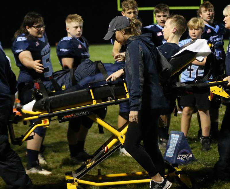 Bureau Valley's Blake Helms is carted off of the field after breaking his leg against Mendota on Friday, Sept. 22, 2023 at Bureau Valley High School.