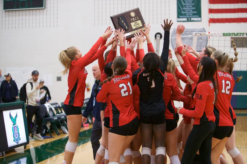Benet celebrates winning the Class 4A Super Sectional Final  against New Trier on Friday, Nov.3,2023 in Bartlett.