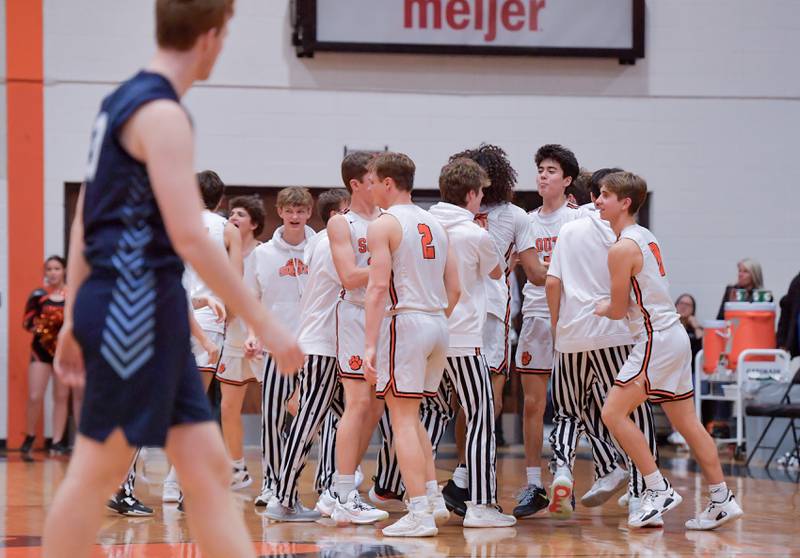 Wheaton Warrenville South celebrate their 42-41 overtime against Lake Park at home on Saturday, Jan. 7, 2023.