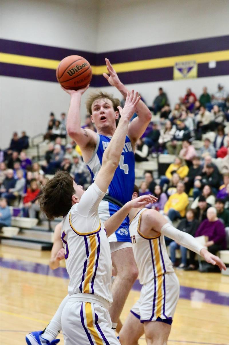 Princeton's Korte Lawson shoots over the top against Mendota Friday night. The Tigers won 60-47.