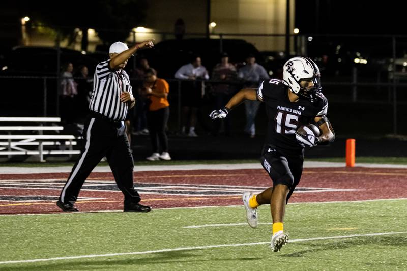 Plainfield North's Treycen Bownes runs the ball during the Oct. 11 game against Minooka held at Plainfield North.