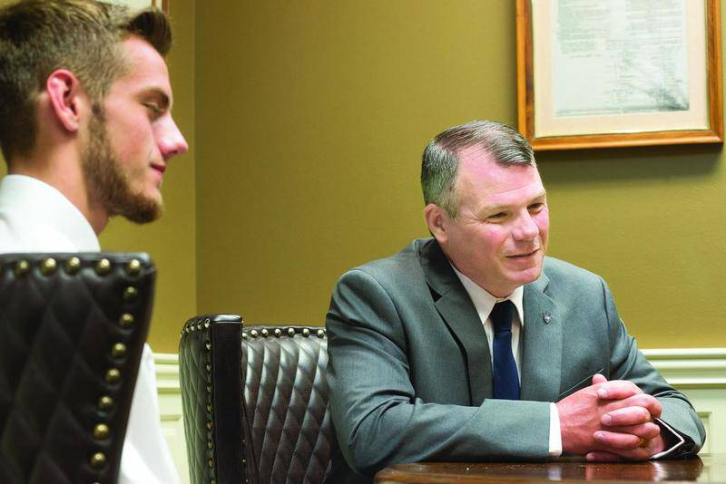 Dixon High School resource officer Mark Dallas, 50, and his son Joshua, 18, talk about the events of May 16, 2018, when DHS senior Matt Milby, 19, opened fire in the high school. Dallas chased the shooter out of the building and shot him in the shoulder; no one else was injured.
