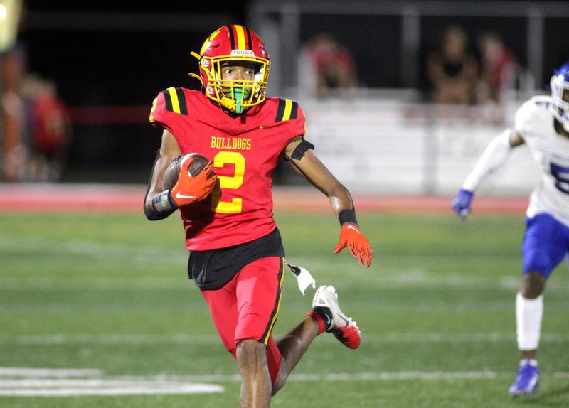 Batavia’s Isaiah Brown runs the ball during the season-opener against Phillips in Batavia on Friday, Aug. 25, 2023.