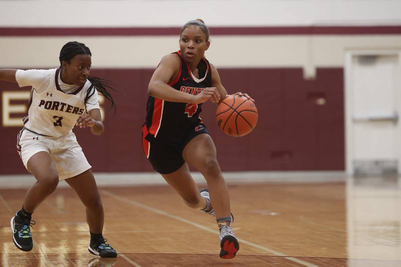 Lincoln-Way Central’s Azyah Newson-Cole drives to the basket against Lockport.