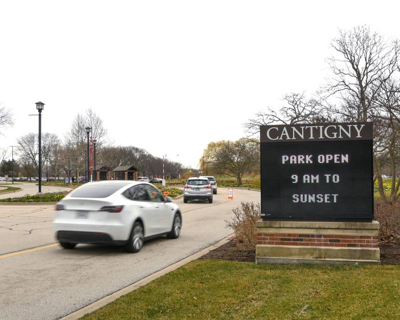 Vehicles enter Cantigny Park in Wheaton for the Easter Egg Hunt event throughout the property on Sunday March 24, 2024.