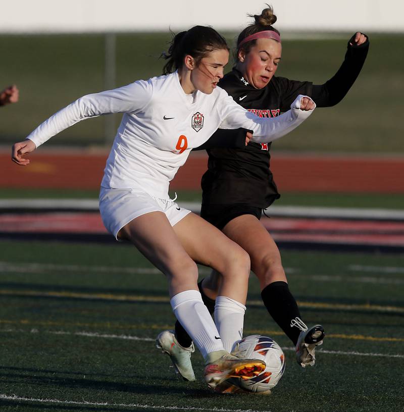 Crystal Lake Central's Avery Watson battles with Huntley's Sofia Bruns for the ball during a Fox Valley Conference  soccer match on Tuesday, April 15, 2025, at Huntley High School.
