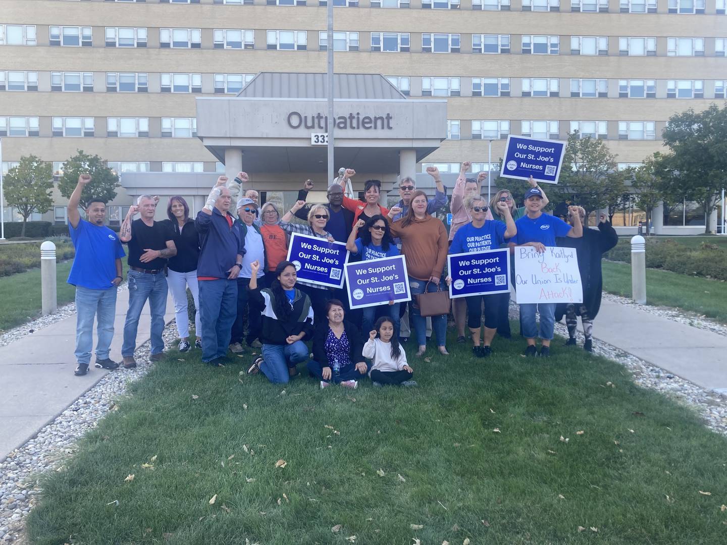 St. Joseph's nurses and members of the community rally outside Ascension St. Joseph--Joliet hospital demanding nurse Kaitlynd French's job be reinstated.