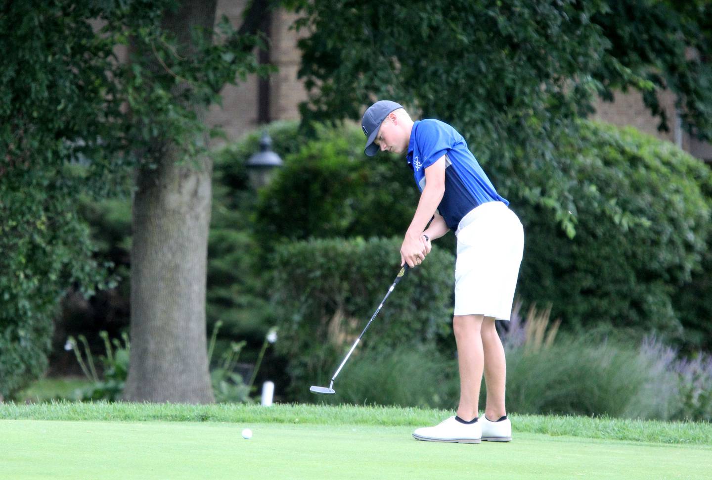 Geneva’s Austin Frick putts during the McChesney Cup golf tournament at the Geneva Golf Club on Monday, Aug. 15, 2022.
