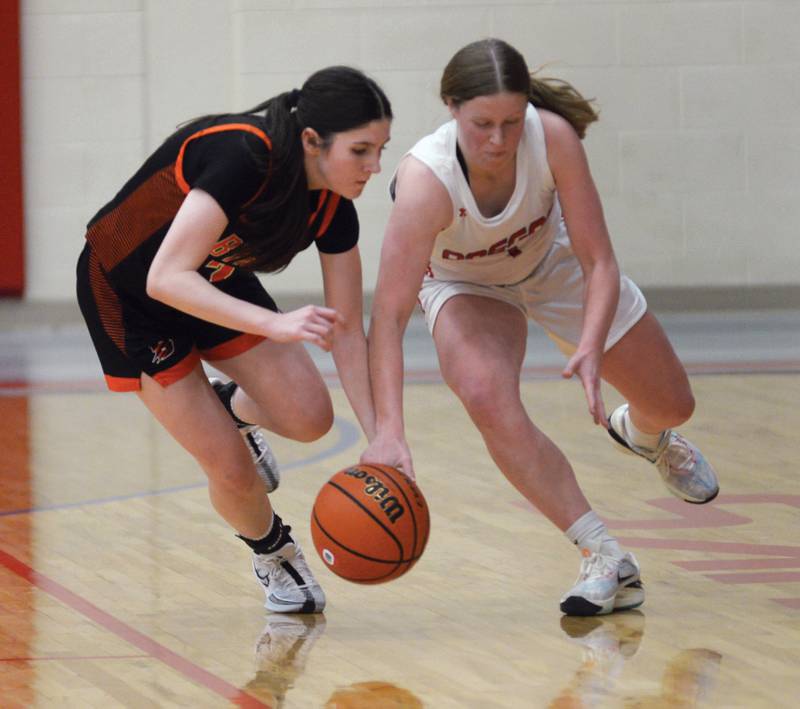 Oregon's Madison Shaffer (right) and a Byron player chase down a loose ball on Wednesday, Jan. 10, 2024 at the Blackhawk Center in Oregon.