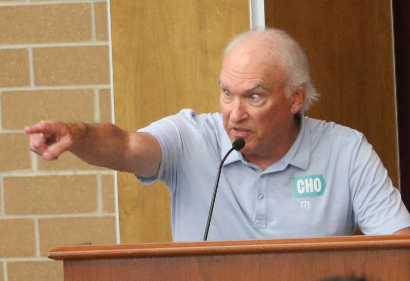 John Armstrong speaks to the Illinois Health Facilities and Services Review Board during a public hearing regarding OSF St. Elizabeth Hospital's plans to reduce services on Tuesday, June 10, at Central Intermediate School in Ottawa.