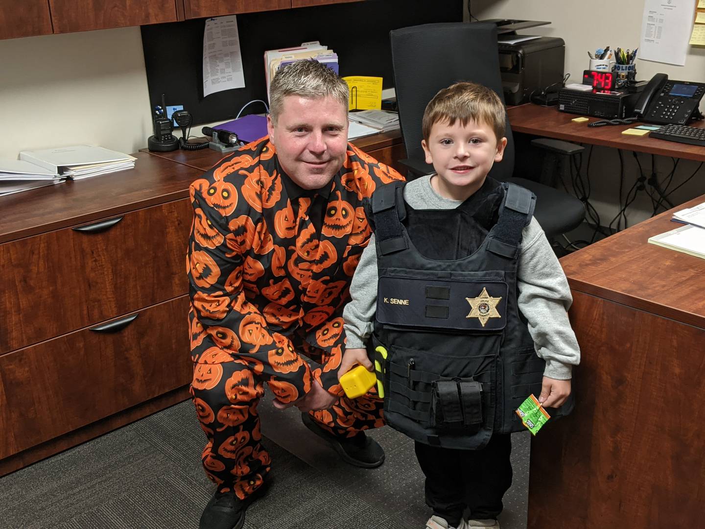 As part of an open house of the Sandwich Police Department's new Public Safety Center on Oct. 25, Sandwich resident Lincoln Libner, 5, got to meet Sandwich Police Chief Kevin Senne, who gave him a police vest to try on.