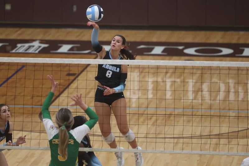 Joliet Catholic’s Olivia Chavanec hits a shot against Providence on Thursday, Sept. 14, in Joliet.