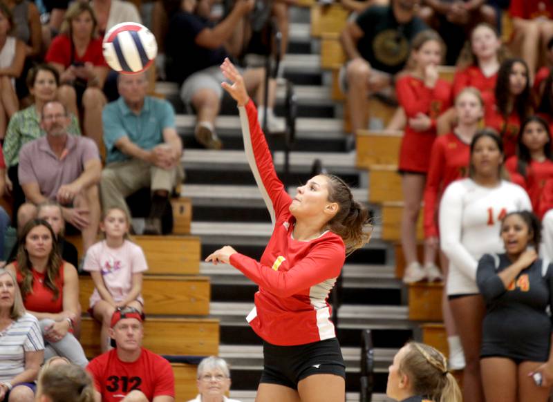 Batavia’s Hallie Crane spikes the ball over the net during a home game against Neuqua Valley on Tuesday, Aug. 29, 2023.