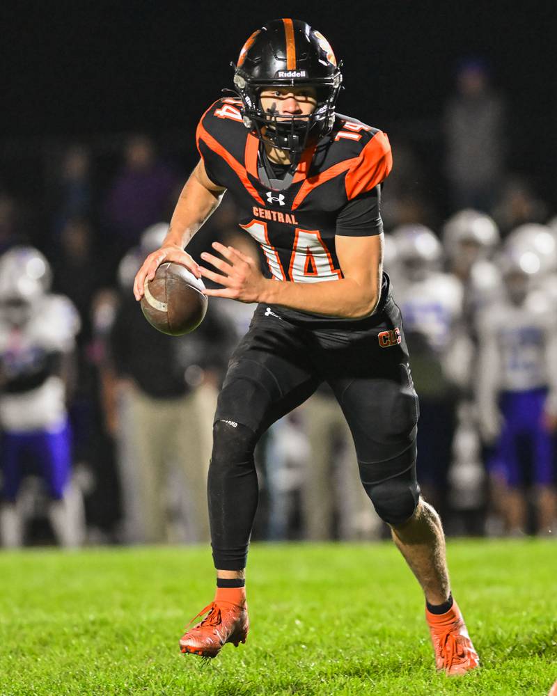 Crystal Lake Central's George Dimopoulos runs for yardage against Fox Valley Conference rival Hampshire on Friday, Oct. 20, 2023 in Crystal Lake.