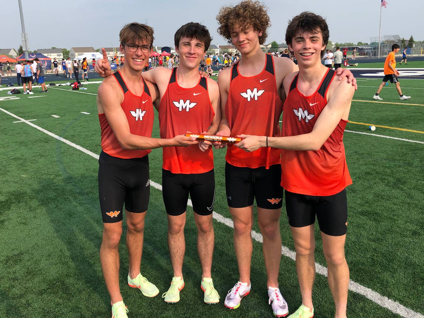 Minooka's Cole Kics, Alex Forster, Emerson Fayman and Zach Balzer set a new meet record in the 4x800-meter relay with a time of 7:48.99, also the fastest time in the state this spring.