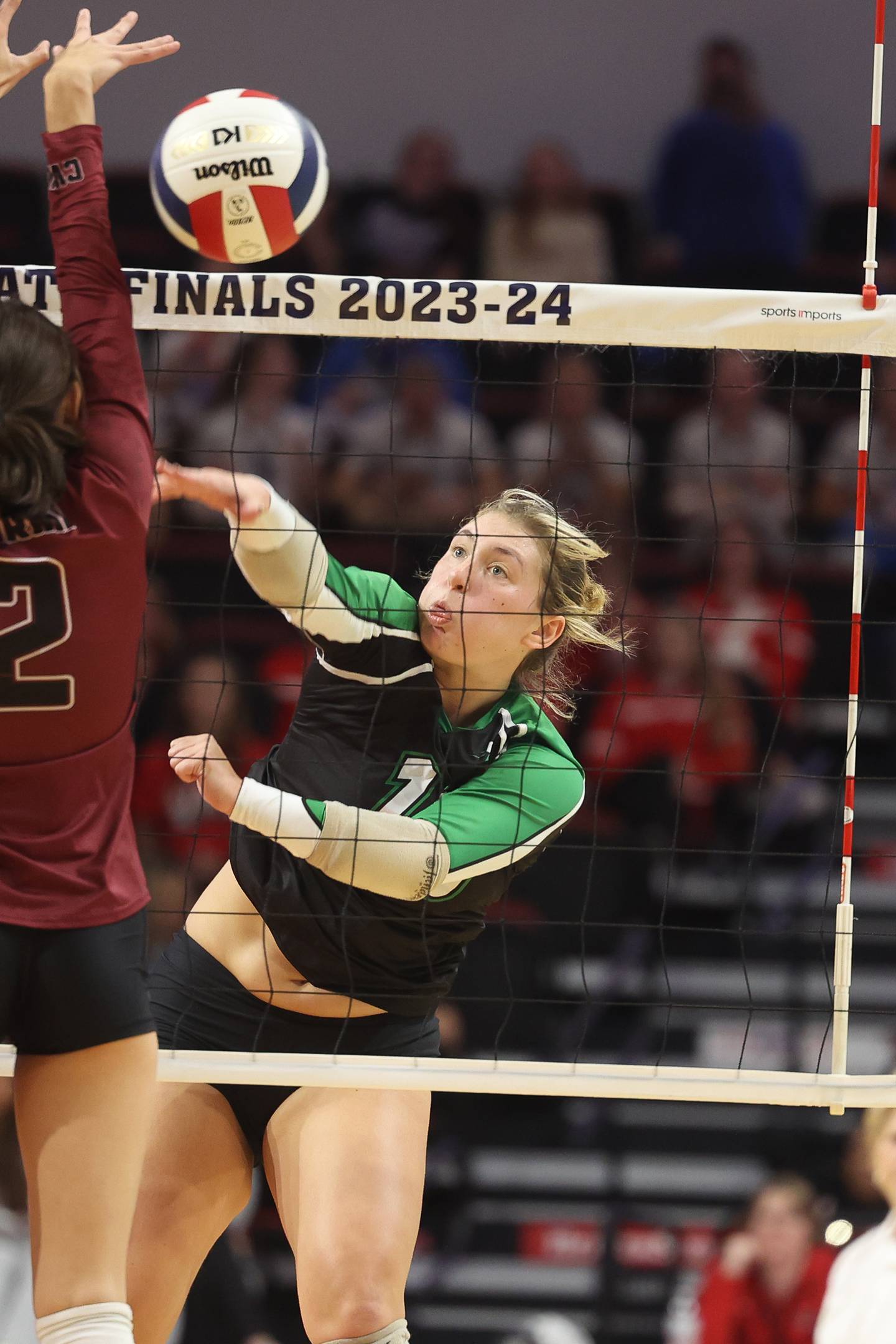 Rock Falls’ Claire Bickett hits a shot against Carmi-White County in the Class 2A Volleyball Third Place match on Saturday, Nov. 11, 2023 in Normal.