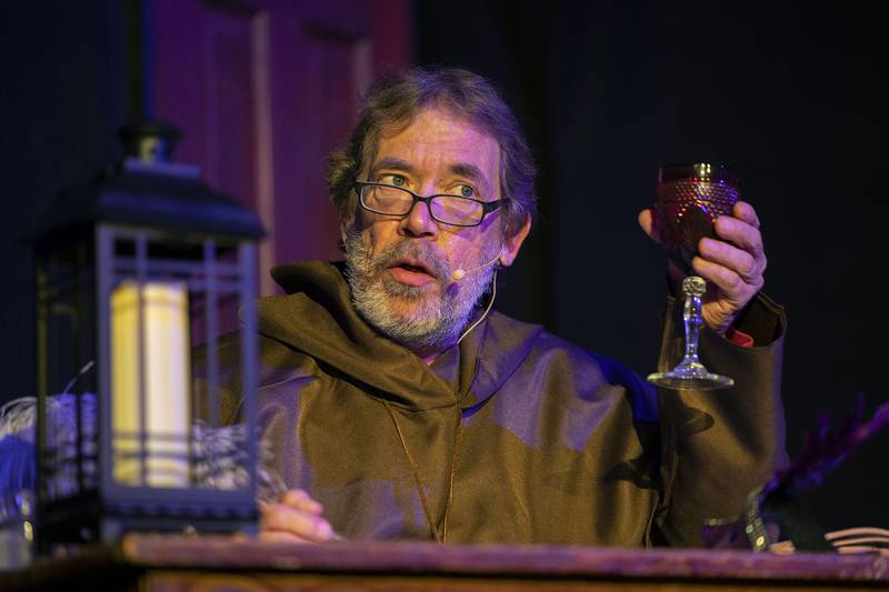 The Scribe, Larry Ubben, offers a bit of history about Edgar Allen Poe while rehearsing PAG’s “Tapestry of Shadows,” Tuesday, Oct. 7, 2025.