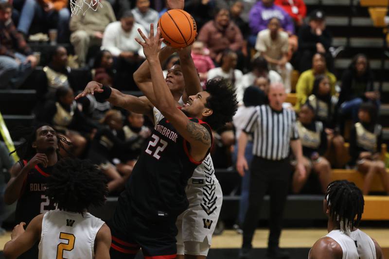 Bolingbrook’s JT Pettigrew gets the basket and the foul against Joliet West on Friday, Jan 24, 2025 in Joliet.
