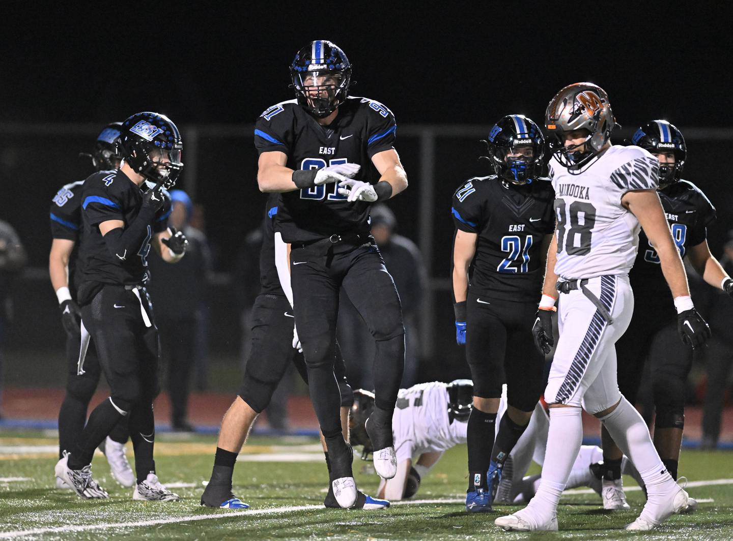 Lincoln-Way East's defensive end Caden O'Rourke celebrates after making a tackle for a loss during the class 8A second round playoff game against Minooka on Friday, Nov. 03, 2023, at Franfort. (Dean Reid for Shaw Local News Network)