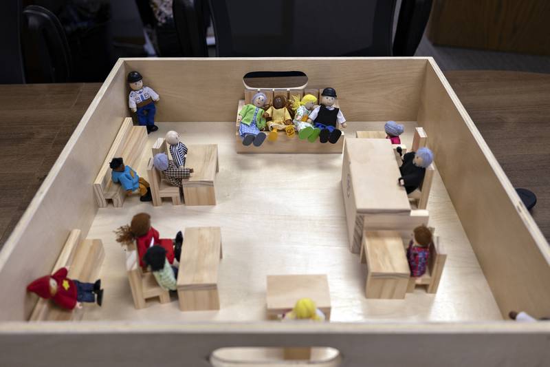A courtroom doll set is seen Wednesday, July 23, 2025, as a tool to help kids learn the layout of the court if the case goes to trial.