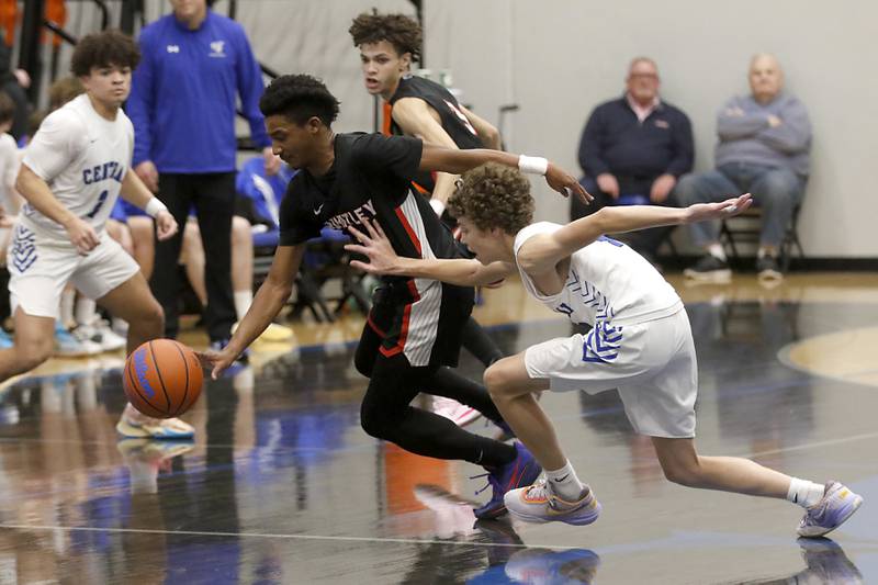 Huntley's Bryce Walker steals the ball from Burlington Central's Ryan Carpenter during a Fox Valley Conference boys basketball game on Friday, Dec. 15, 2023, at Burlington Central High School.