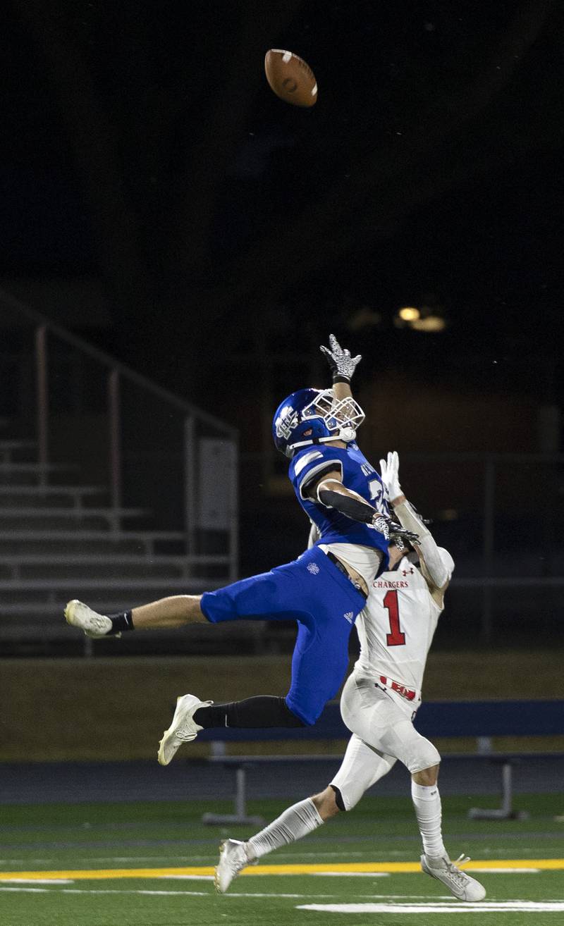 Newman’s Brady Williamson leaps but can’t break up the pass intended for Orion’s Owen Voorhees Friday, Sept. 20, 2024, at Roscoe Eades Stadium in Sterling.