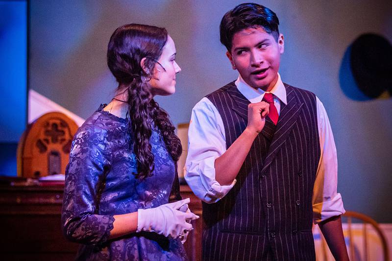 Brinley Francis and Israel Grande rehearse a scene from Sterling High School's  “You Can't Take It With You” Wednesday, Oct. 26, 2022. There will be three showings at Centennial Auditorium: Friday and Saturday at 7:30 p.m. and Sunday at 2 p.m.