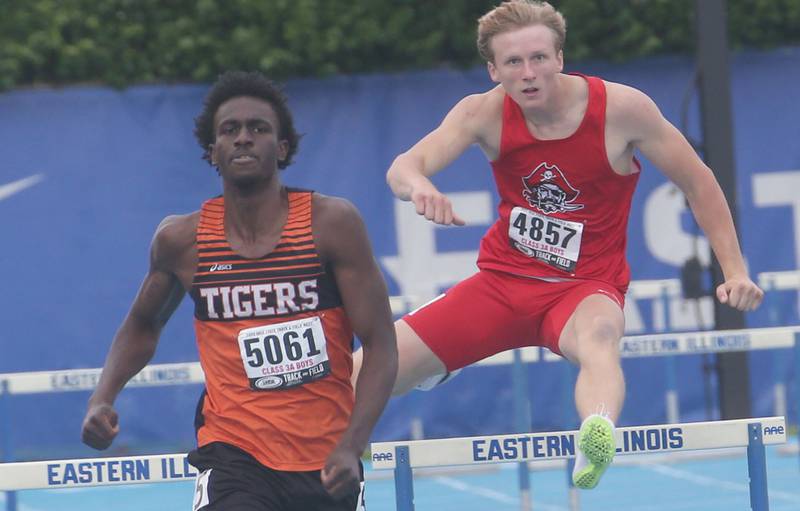 Wheaton North's Amari Williams and Ottawa's Weston Averkamp compete in the 300 hurdles during the IHSA Class 3A Boys Track & Field State Finals on Saturday, May 31, 2025 at Eastern Illinois University in Charleston.