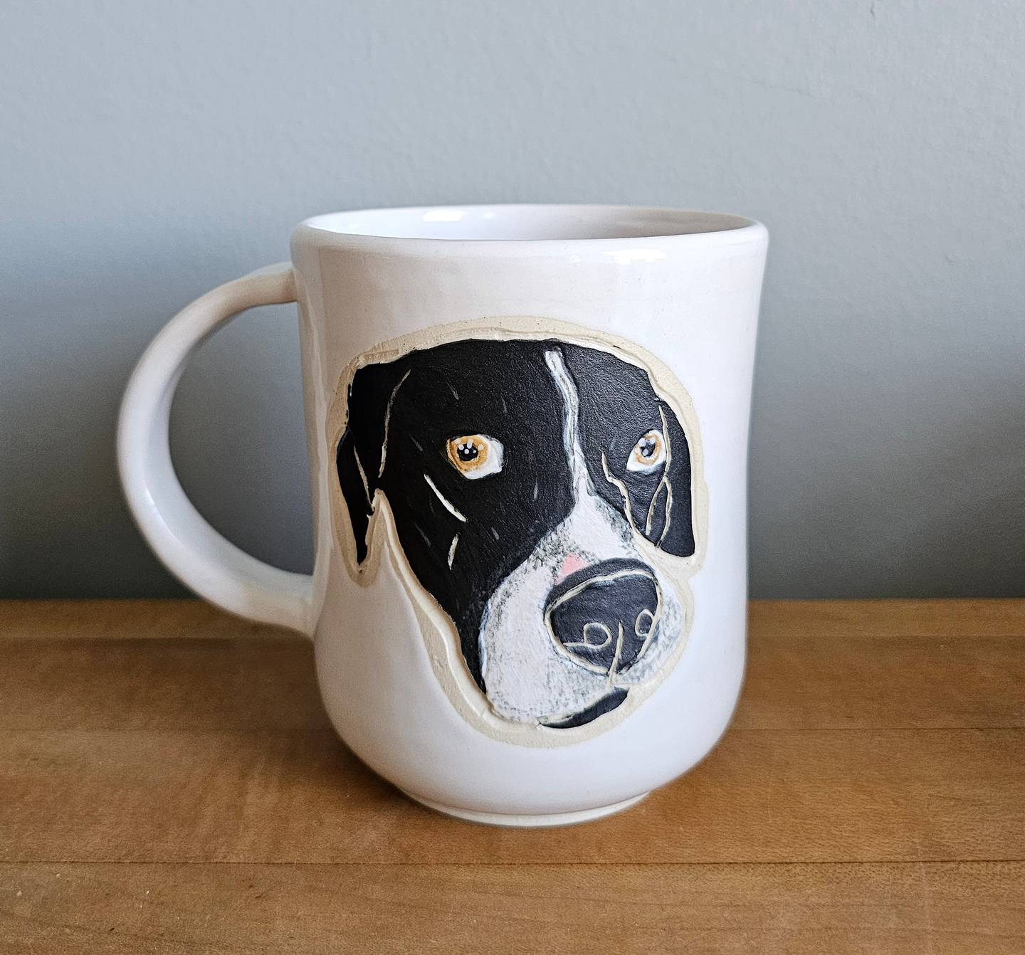 Liza Mitchem works to illustrate both the physical attributes and unique personalities of pets on her commissioned mugs.