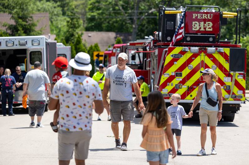Families attend the Touch a Truck event on Saturday, June 28, 2025 at Centennial Park in Peru.