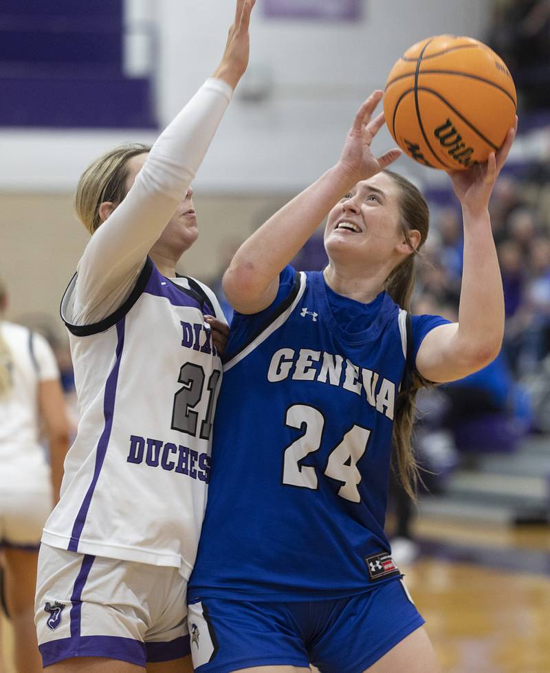 Geneva’s Frances Myszkowski looks to put up a shot against Dixon’s Reese Dambman Thursday, Feb. 19, 2026, in the Class 3A girls basketball regional title game.