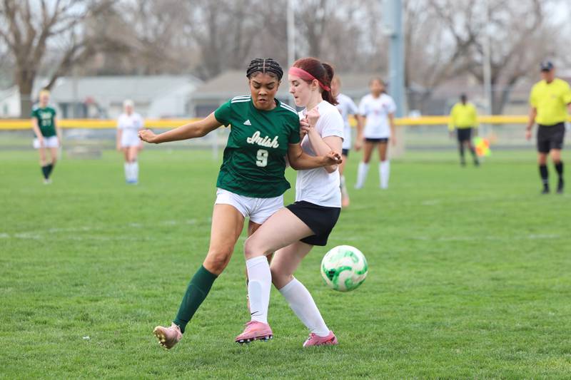 Bishop McNamara's Kaneyce Davis (9), collides with Bradley-Bourbonnais' Jamisen Parker during the Boilermakers' 9-1 win over Bishop McNamara in All-City play on Tuesday, March 31, 2026.