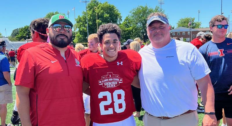 La Salle-Peru's Chris Swayne (center) poses for a photo with L-P coach Jose Medina (left) and L-P assistant Jason Hartman after the Illinois High School Shrine Game on Saturday.