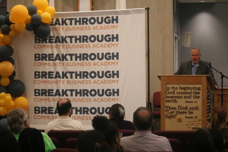 Opportunity DeKalb executive director Chad gives opening remarks Monday, June 2, 2025, to kick off the graduation of Breakthrough Community Business Academy's second cohort.