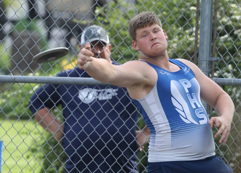 Princeton's Bennett Williams throws the discus in Friday's TRAC Meet at Princeton.