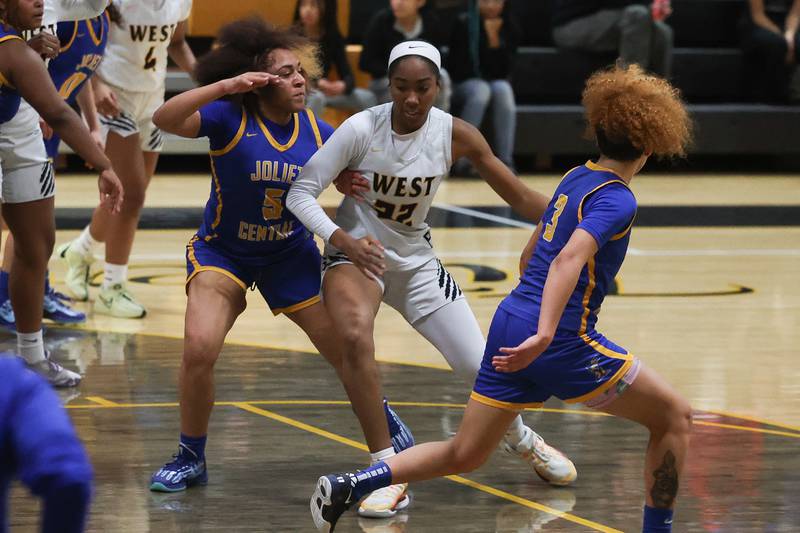 Joliet West’s Makayla Chism looks to make a play against Joliet Central on Thursday, Jan 30, 2025 in Joliet.