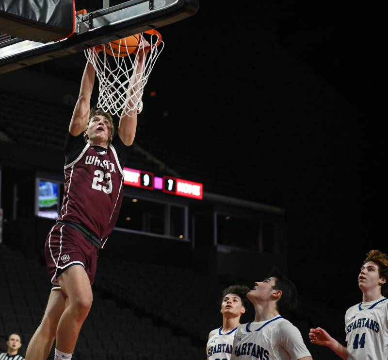 Wheaton Academy’s Hayden Schroeder gets his second dunk of the first quarter during a boys basketball game against St. Francis, which was played at NOW Arena on Thursday, Jan. 16, 2025 in Hoffman Estates.