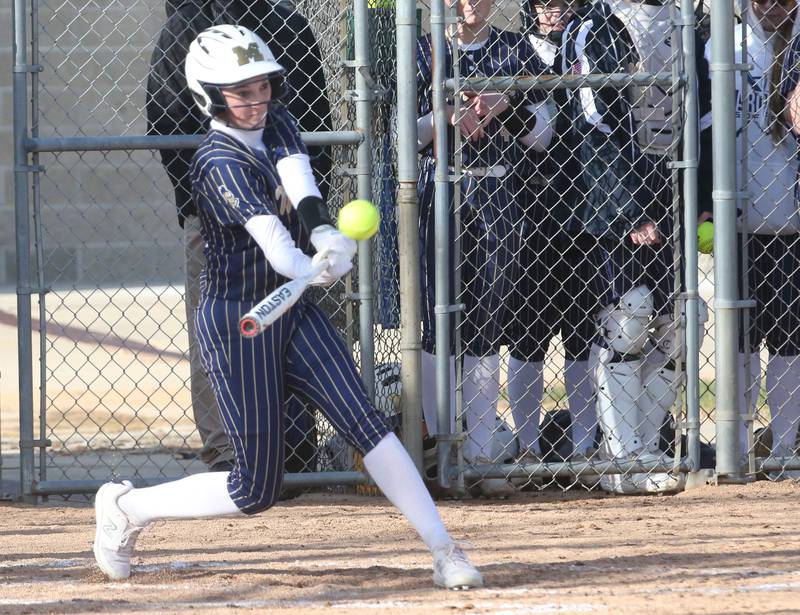 Marquette's Kealey Rick blasts a home run against Woodland/Flanagan-Cornell on Wednesday, March 27, 2024 in Ottawa.