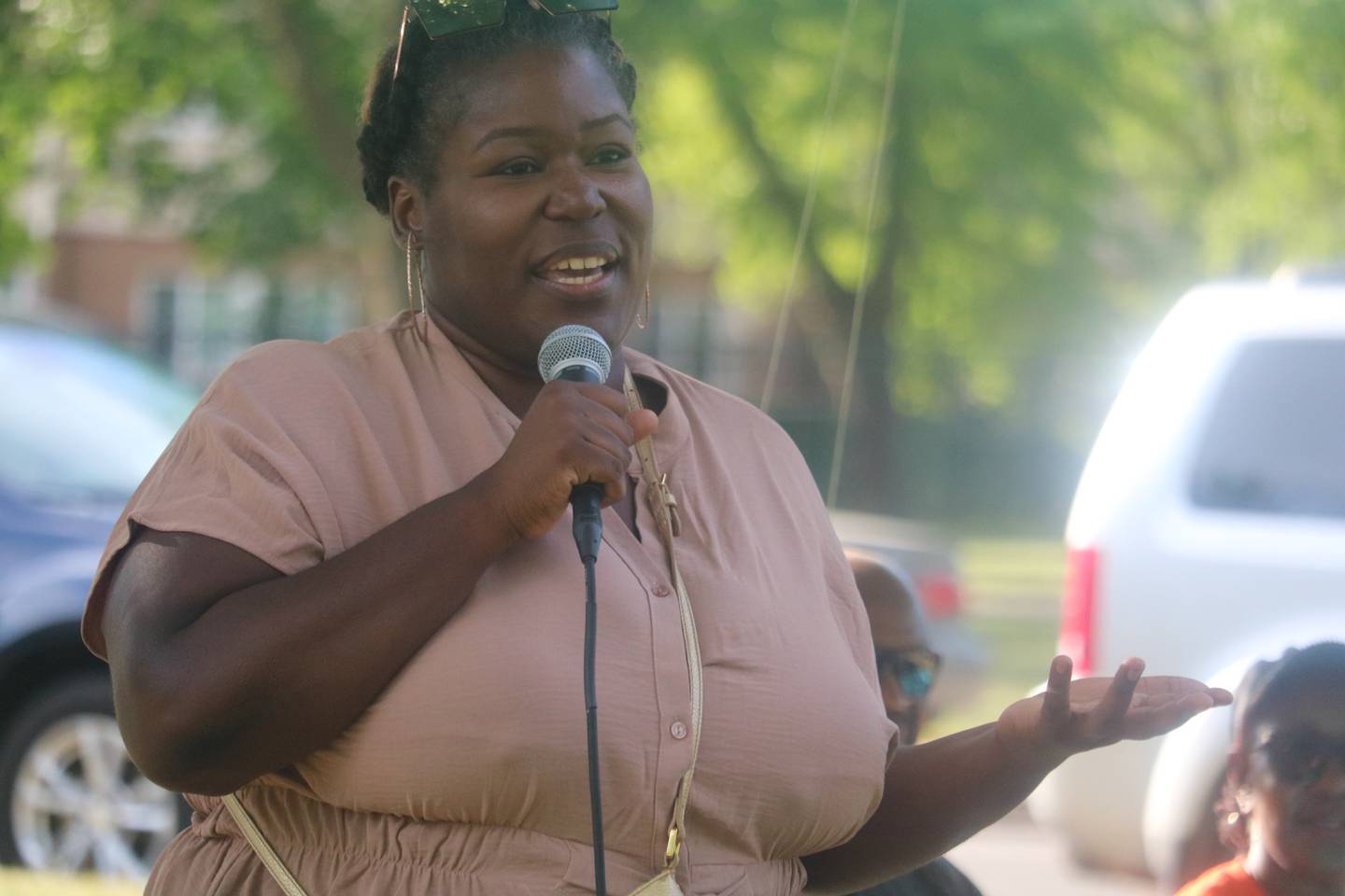 Danita Sims, director of programming and community development at Breakthrough Community Business Academy, speaks during the program's launch event June 18, 2024 at Welsh Park in DeKalb.