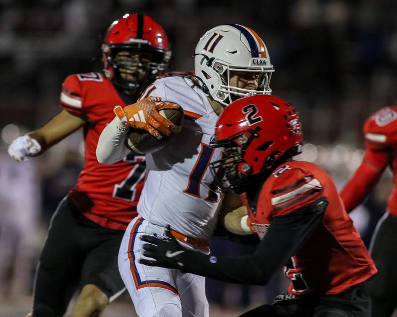 Oswego's Teddy Manikas (11) cuts back on the way to the endzone off of a pass over the middle during a football game between Oswego at Bolingbrook on Friday, Oct 4th, 2024  in Bolingbrook.