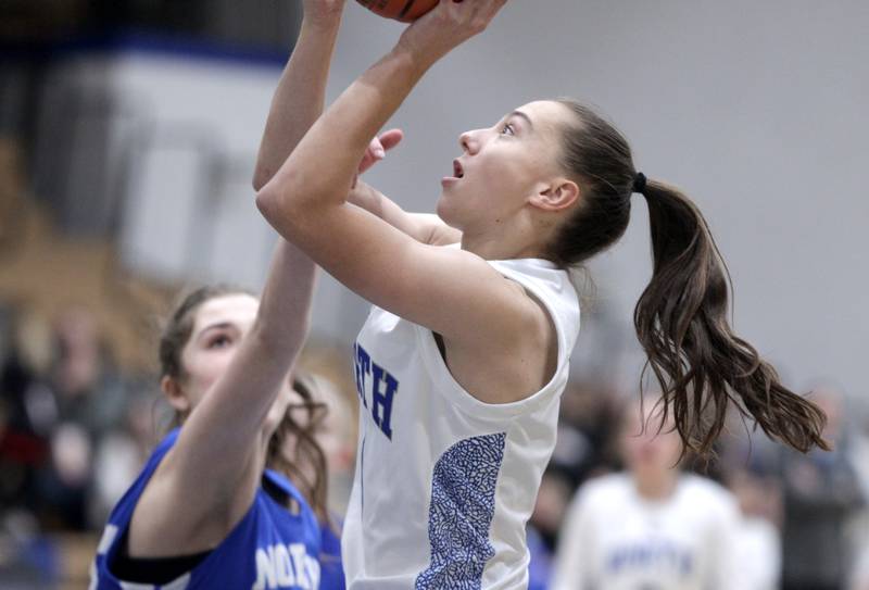 St. Charles North’s Laney Stark shoots the ball during the Class 4A St. Charles North Regional final against Wheaton North on Thursday, Feb. 16, 2023.