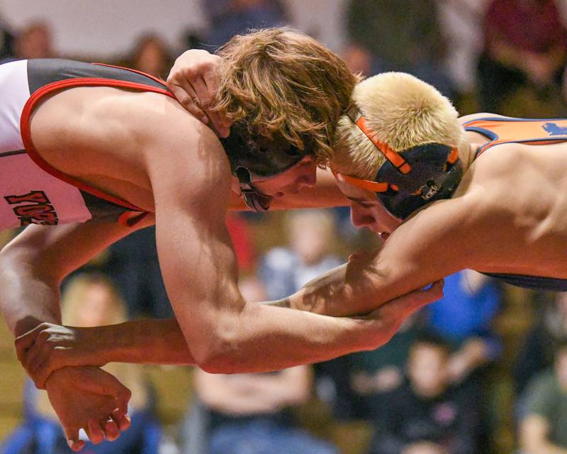 Oswego's Aiden Ortiz, right, tries to control Yorkville's Nathan Craft during the 126-weight class on Thursday Dec. 19, 2024, where Aiden took the win 18-8 held at Yorkville’s Freshman Center.