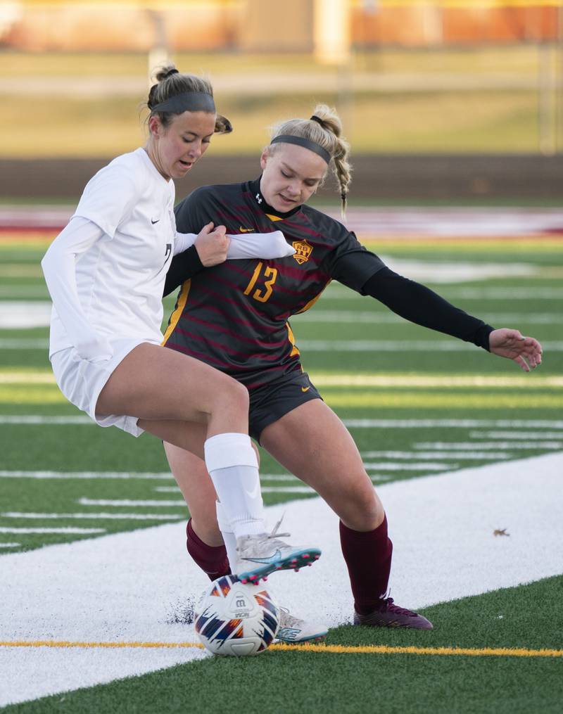 Prairie Ridge's Grace Turman keeps the ball away from Richmond-Burton's Jordan Otto during their game on Wednesday, April 5, 2023 at Richmond-Burton High School in Richmond. Ryan Rayburn for Shaw Local