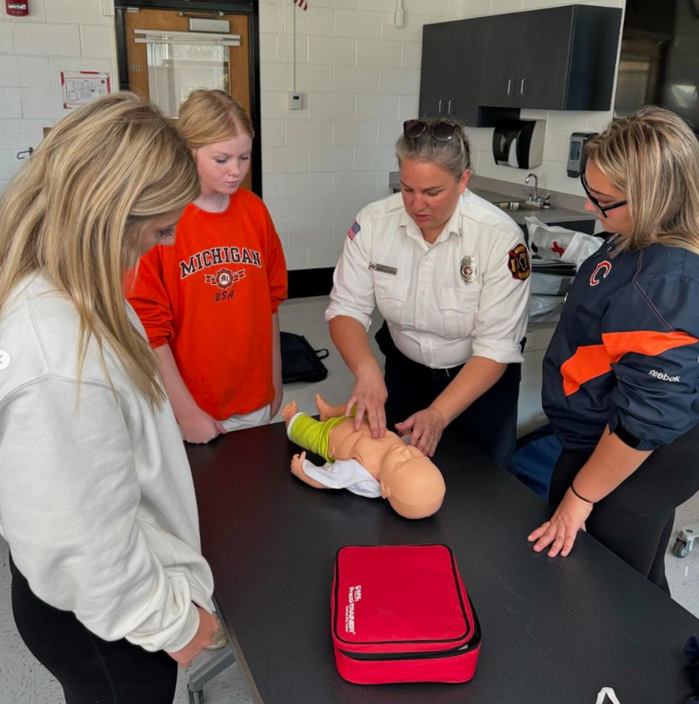 McHenry High School students learn infant CPR as part of the biomedical program.