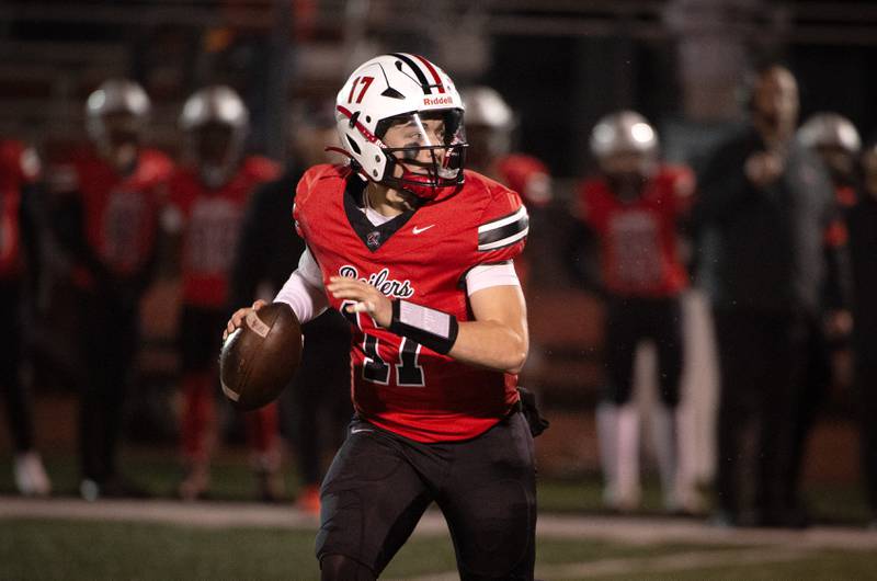 Bradley-Bourbonnais' Ellis Johnson looks to pass in a Class 6A playoff game against Shepard on Friday, October 31, 2025.