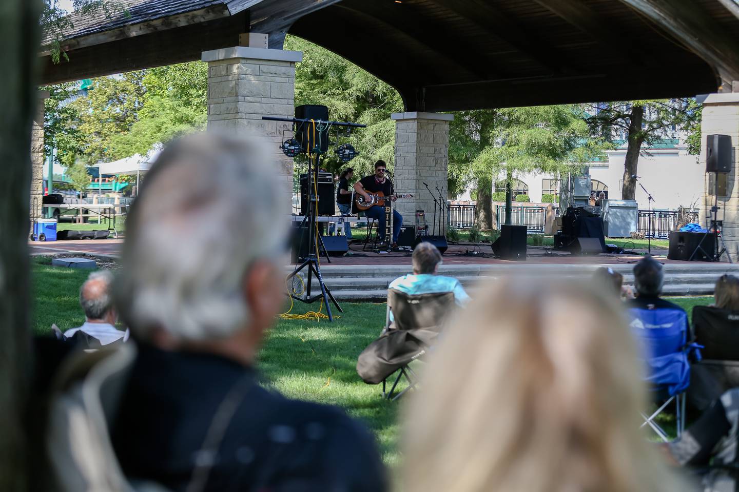 Doug Rockwell and Sandy Fonsecal enjoy the performances at the Joliet Blues Festival at Bicentennial Park.  Aug 13, 2022.