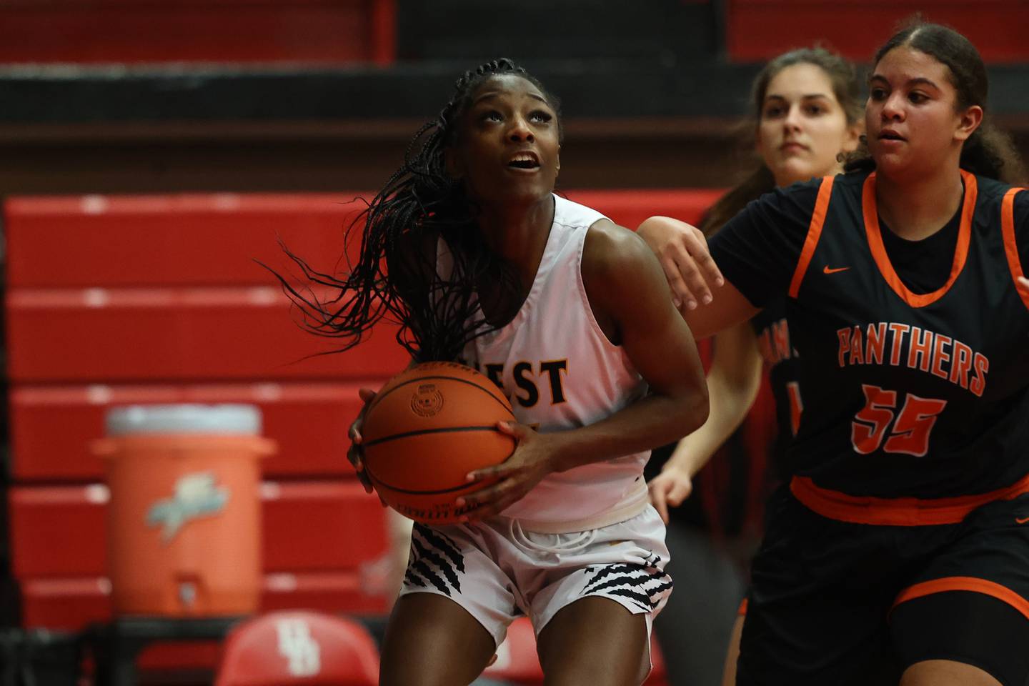 Joliet West’s Destiny McNair works under the basket for a shot against East Moline United in the Class 4A Bradley-Bourbonnais Regional championship on Friday, February 17th, 2023 in Bradley.