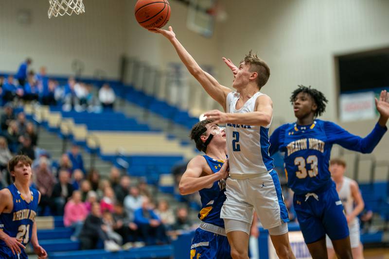 Geneva’s Michael Lawrence (2) drives to the basket against Wheaton North during a basketball game at Geneva High School on Friday, Jan 6, 2023.
