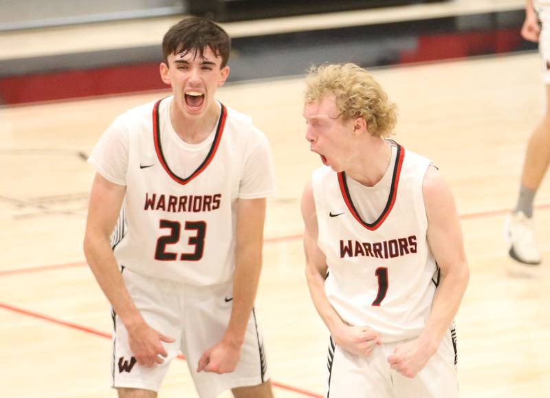 Woodland's Nick Plesko and teammate Connor Dodge react after hitting a three-point basket over Flanagan-Cornell during the Route 17 Classic Tournament on Wednesday, Nov. 27, 2024 at Woodland High School.